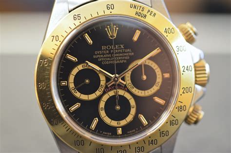 rolex daytona acciaio e oro quadrante nero al braccio|Orologio Rolex Cosmograph Daytona in acciaio Oystersteel.